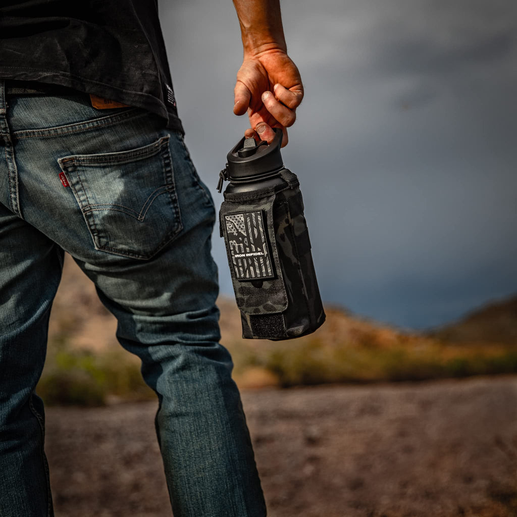 Iron Infidel Battle Bottle - Half Gallon Insulated Water Bottle with Paracord Handle, Large 64 oz Stainless Steel Water Jug with Rugged, Removable Sleeve for Keys, Wallet, & Phone (Live Free 2 Liter)
